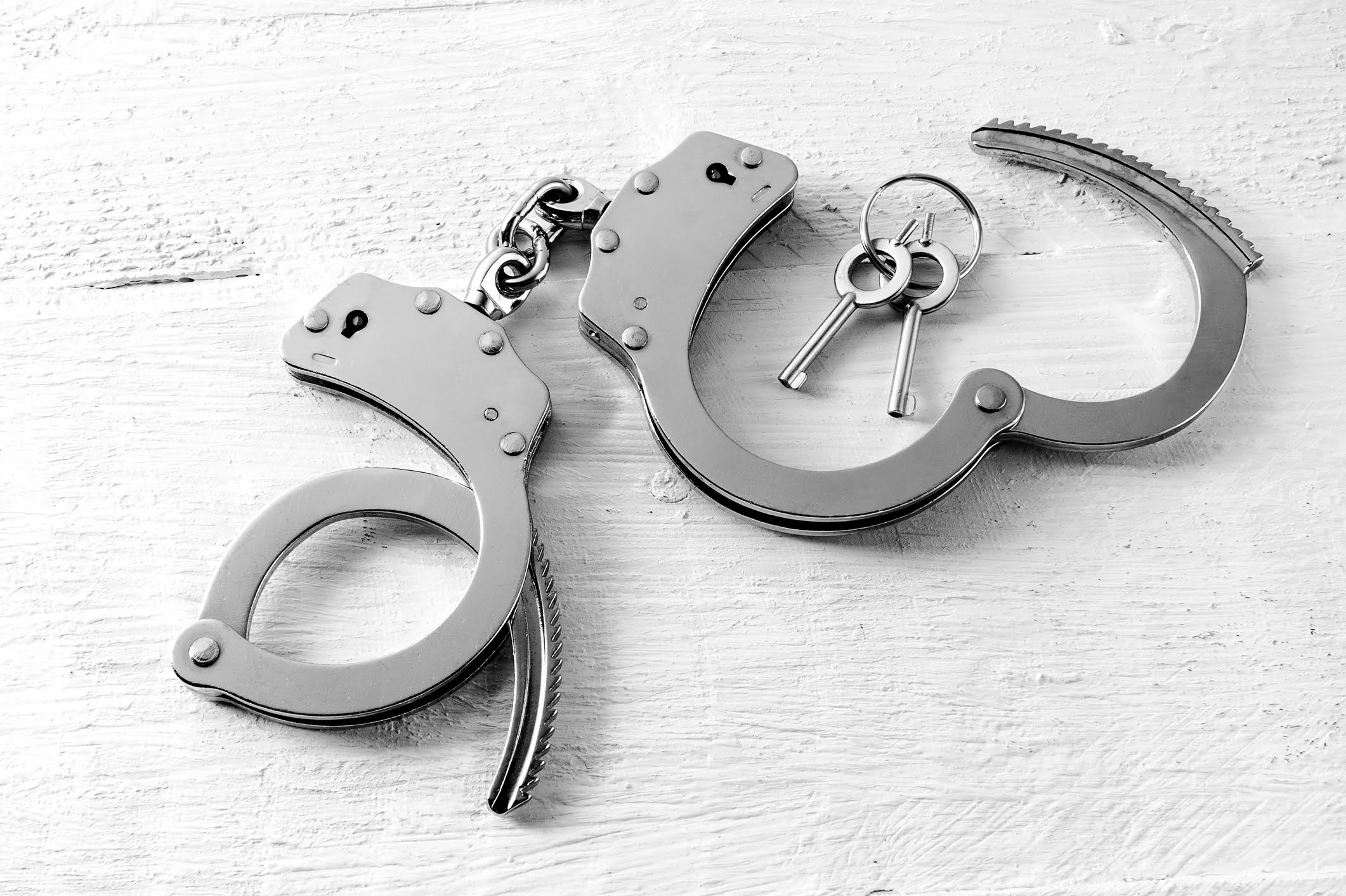 The Most Common Misdemeanors and Felonies in Vista, California 1 Handcuffs with keys