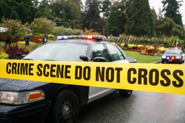San Diego Murder Defense Lawyer Peter M. Liss 1 Police tape in front of police vehicles
